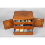 Oak canteen of George V silver cutlery, canteen with three fitted drawers, fitted with five piece