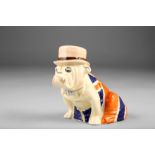 Royal Doulton Winston Churchill bulldog figure, draped in a Union flag and smoking a cigar, 13cm