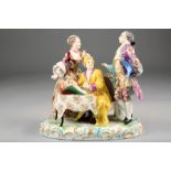 19th Century hard paste porcelain figure group, raised on a Rococo base, gilt crown mark, 23cm long,