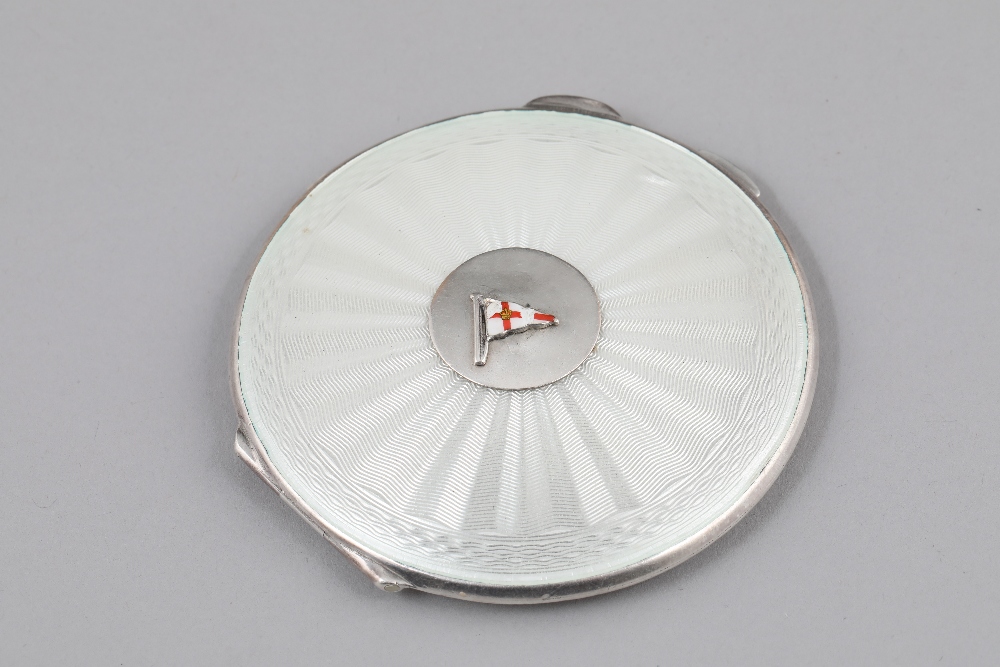 Ladies silver and enamel compact, circular form, engine turned decoration with central yachting