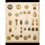 Insignia of various South African Departments, Corps and Regiments A card bearing metal cap and
