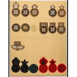 Army Tradesman and Employment Badges A card of sleeve badges, mainly in worsted embroidery on khaki,