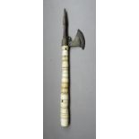 ˜AN INDIAN AXE, 19TH CENTURY with iron head formed with a robust faceted central spike, small