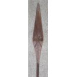 AN AFRICAN PADDLE CLUB, 20TH CENTURY, PROBABLY NIGERIA with broad flat head carved with