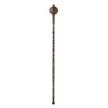 AN INDIAN MACE FORMED ENTIRELY OF IRON, 18TH CENTURY with faceted near spherical head, and long