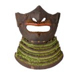 ‡ A JAPANESE IRON FACE DEFENSE (MEMPO), EDO PERIOD of russet iron with a detachable nose, brittle