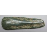 A PACIFIC AXE HEAD, 19TH CENTURY, PROBABLY NEW CALEDONIA of tapering near rectangular form, the