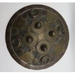 AN INDIAN SHIELD (DHAL), LATE 18TH/19TH CENTURY of shallow-convex hide-covered wood, the inner