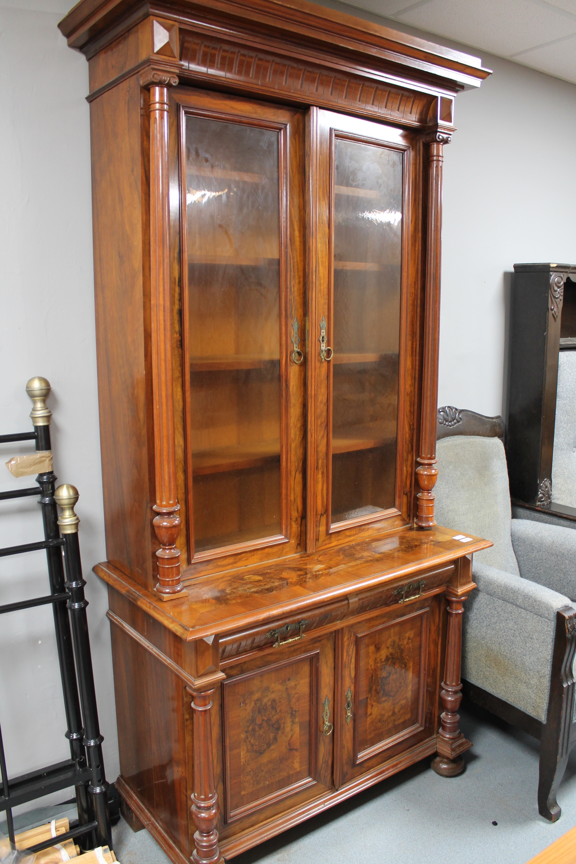 A continental walnut and mahogany bookcase with pillar supports CONDITION REPORT: - Image 5 of 9