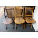 Three mid 20th century folding wooden chairs