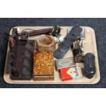 A tray of opera glasses, miniature sewing machine, pipe rack, cigarette case,