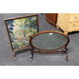 An antique mahogany dressing table mirror together with an oak framed tapestry fire screen