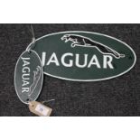 Two cast iron plaques - Jaguar