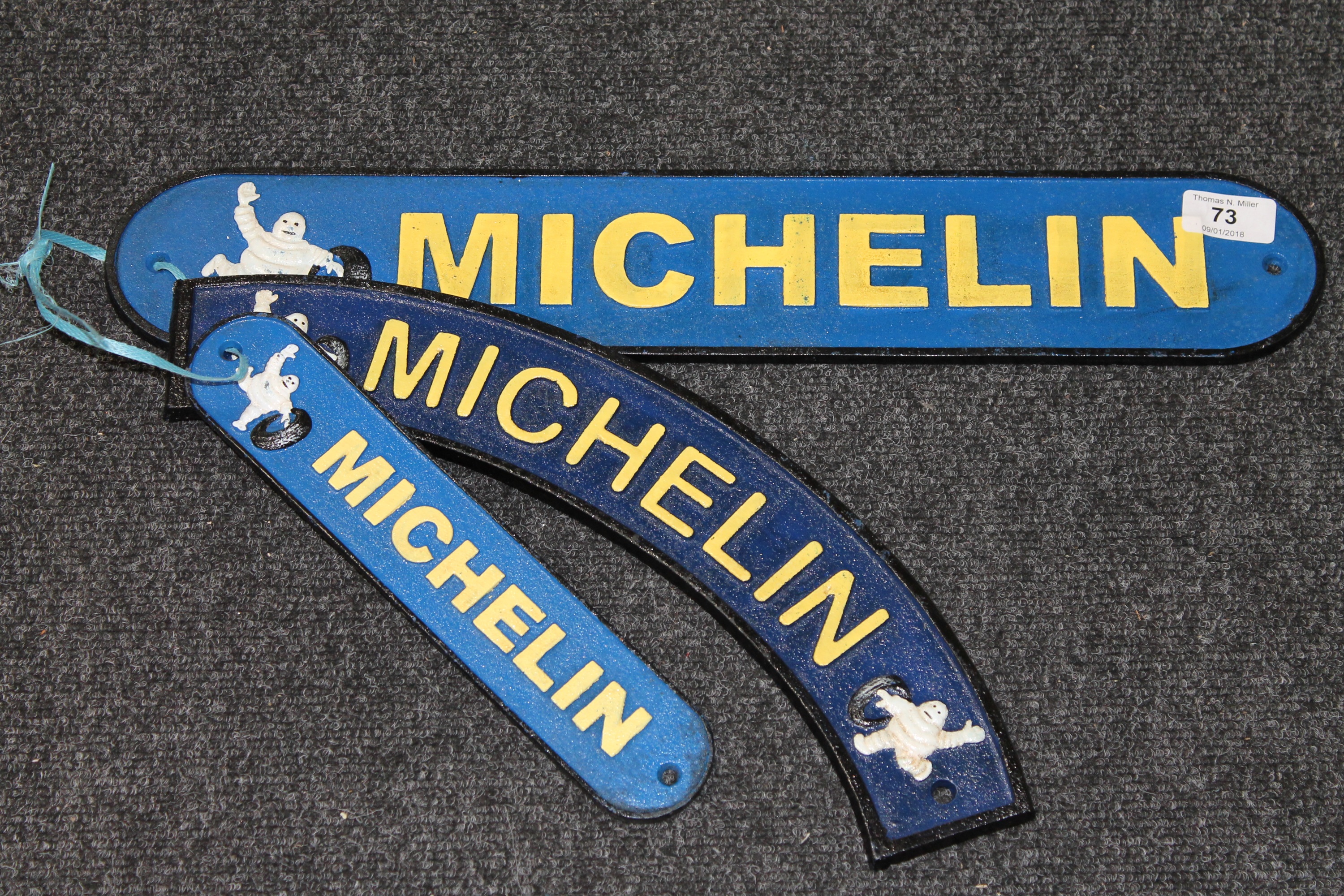 Three cast iron plaques - Michelin signs