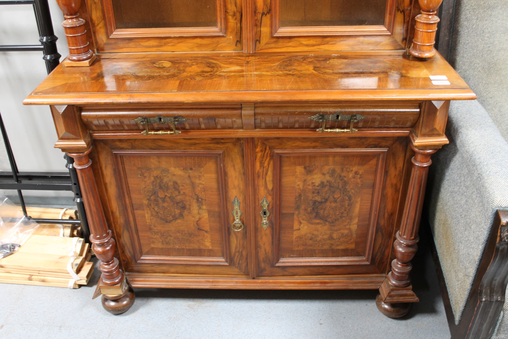 A continental walnut and mahogany bookcase with pillar supports CONDITION REPORT: - Image 6 of 9