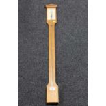 An oak stick barometer