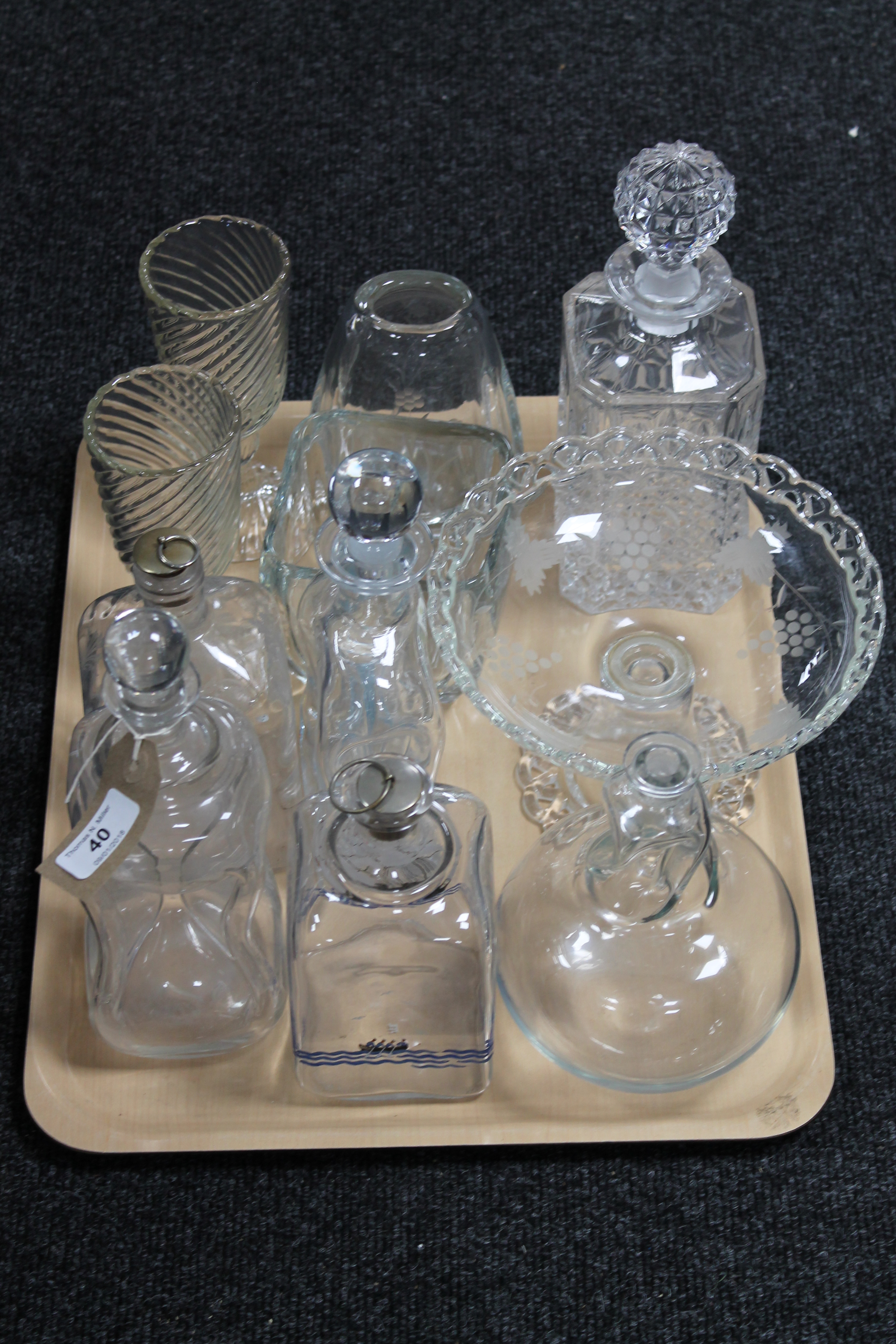 A tray of continental glass ware, decanters,