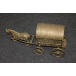 A heavy brass gypsy caravan with horse CONDITION REPORT: Measures 52cm long,