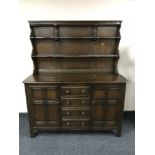 An Ercol double door sideboard fitted four drawers