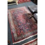 A fringed Persian Hamadan rug,