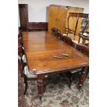 A Victorian mahogany wind-out dining table with three leaves and eight chairs CONDITION