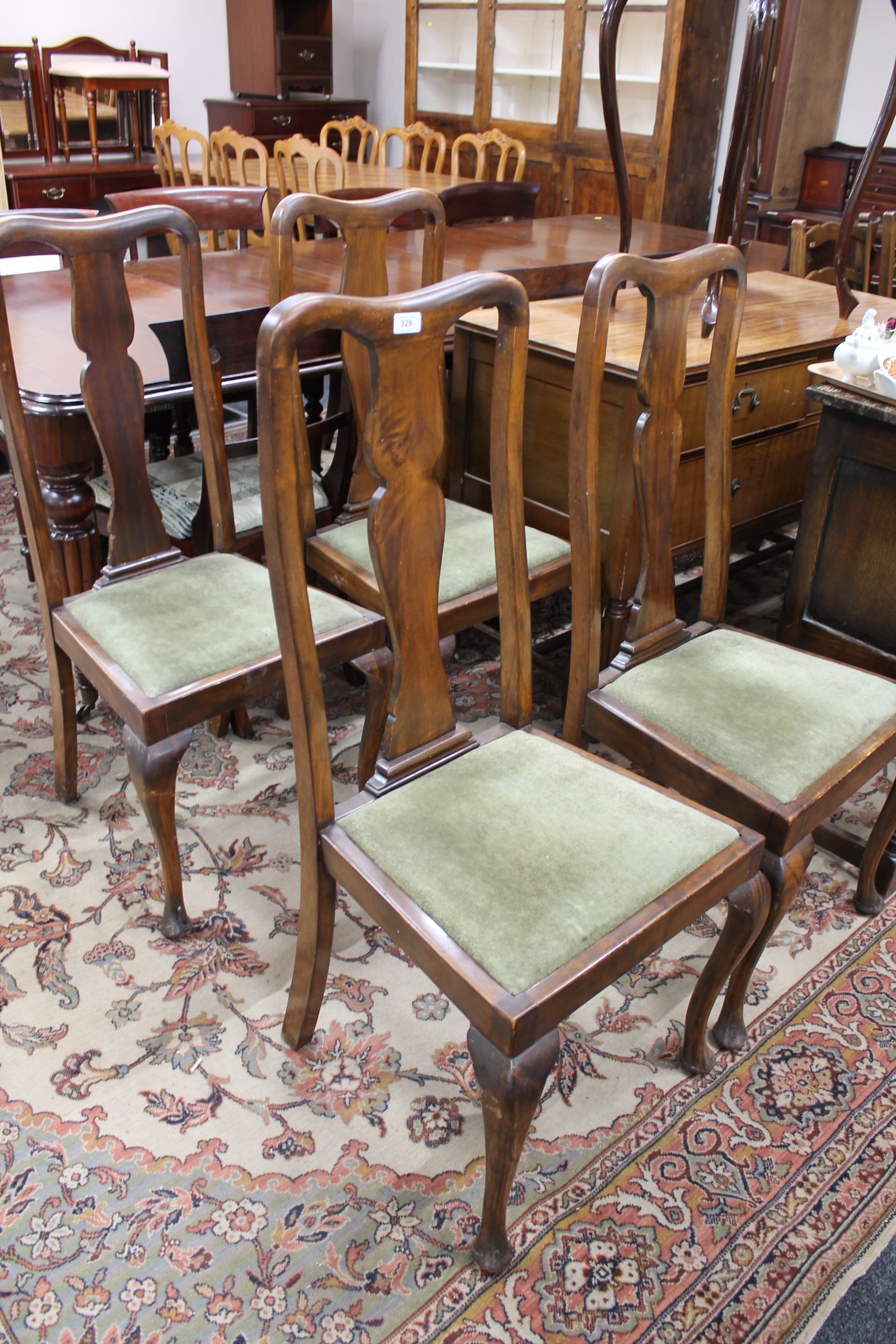 A set of four Queen Anne style dining chairs