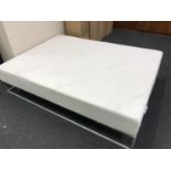 A 5' Ergoflex memory foam mattress,