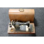 A walnut cased Pfaff hand sewing machine