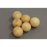 Six early 19th century ivory billiard balls CONDITION REPORT: These each measure 5cm
