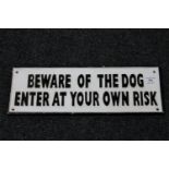 A cast iron sign - Beware of the dog