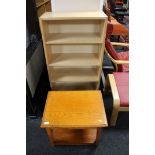 A set of contemporary open shelves and an oak coffee table