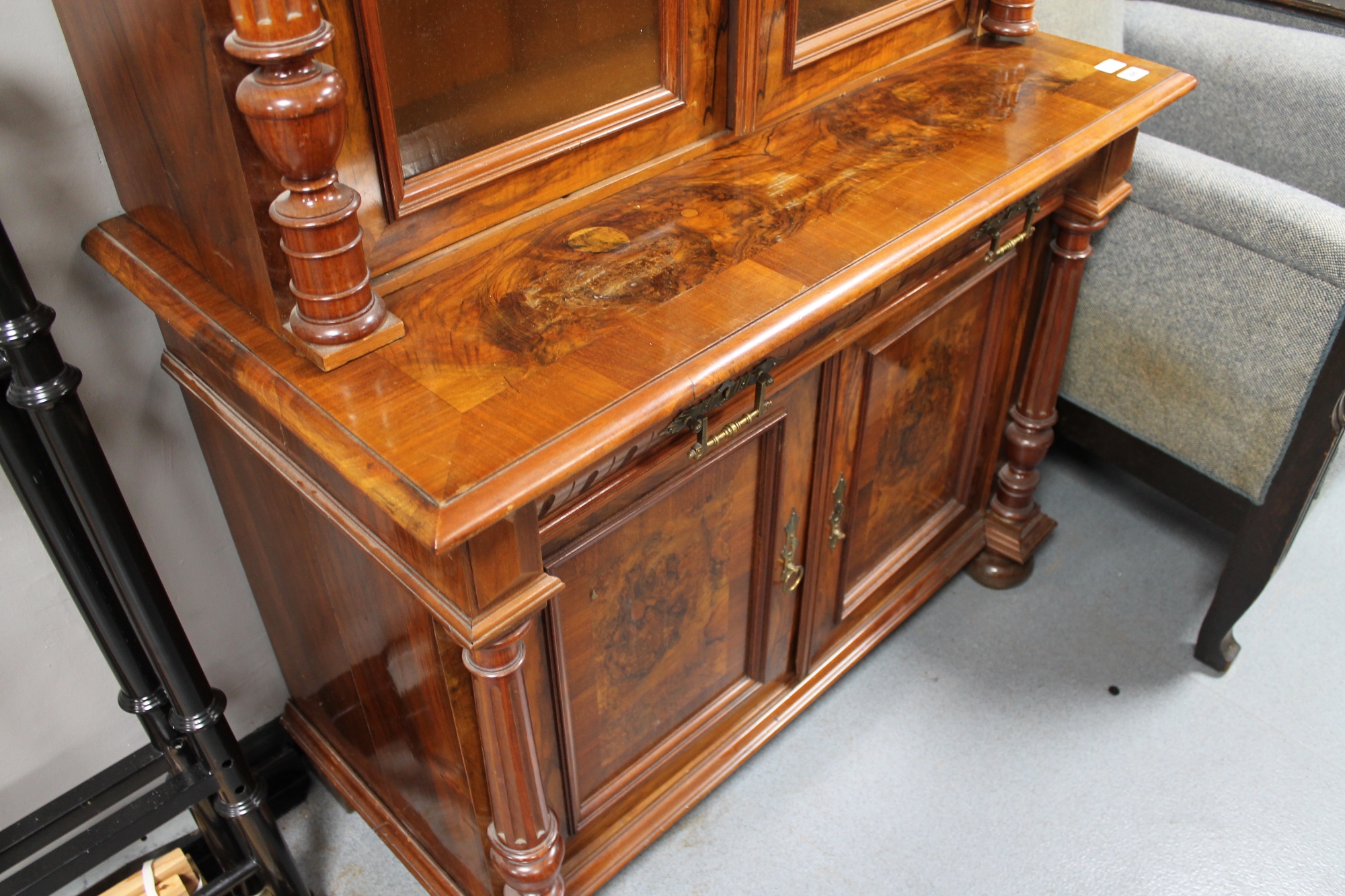 A continental walnut and mahogany bookcase with pillar supports CONDITION REPORT: - Image 4 of 9