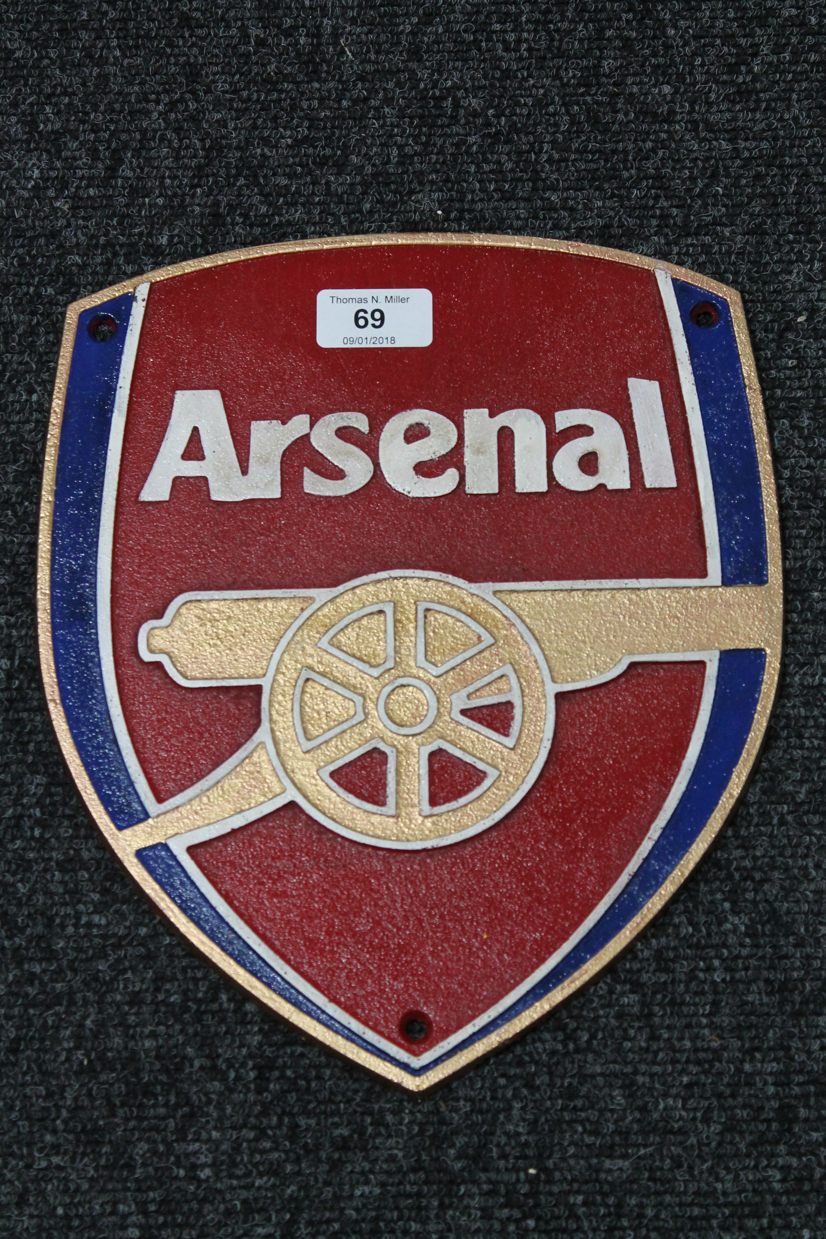 A cast iron Arsenal football plaque