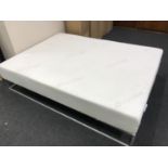 A 5' Ergoflex memory foam mattress,