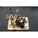 A tray of brass candelabra,