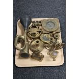 A tray of assorted brass ware, ashtrays,