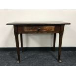 An antique hall table on pad feet