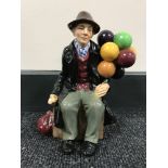 A Royal Doulton china figure : The Balloon Man, HN 1954, height 19 cm.