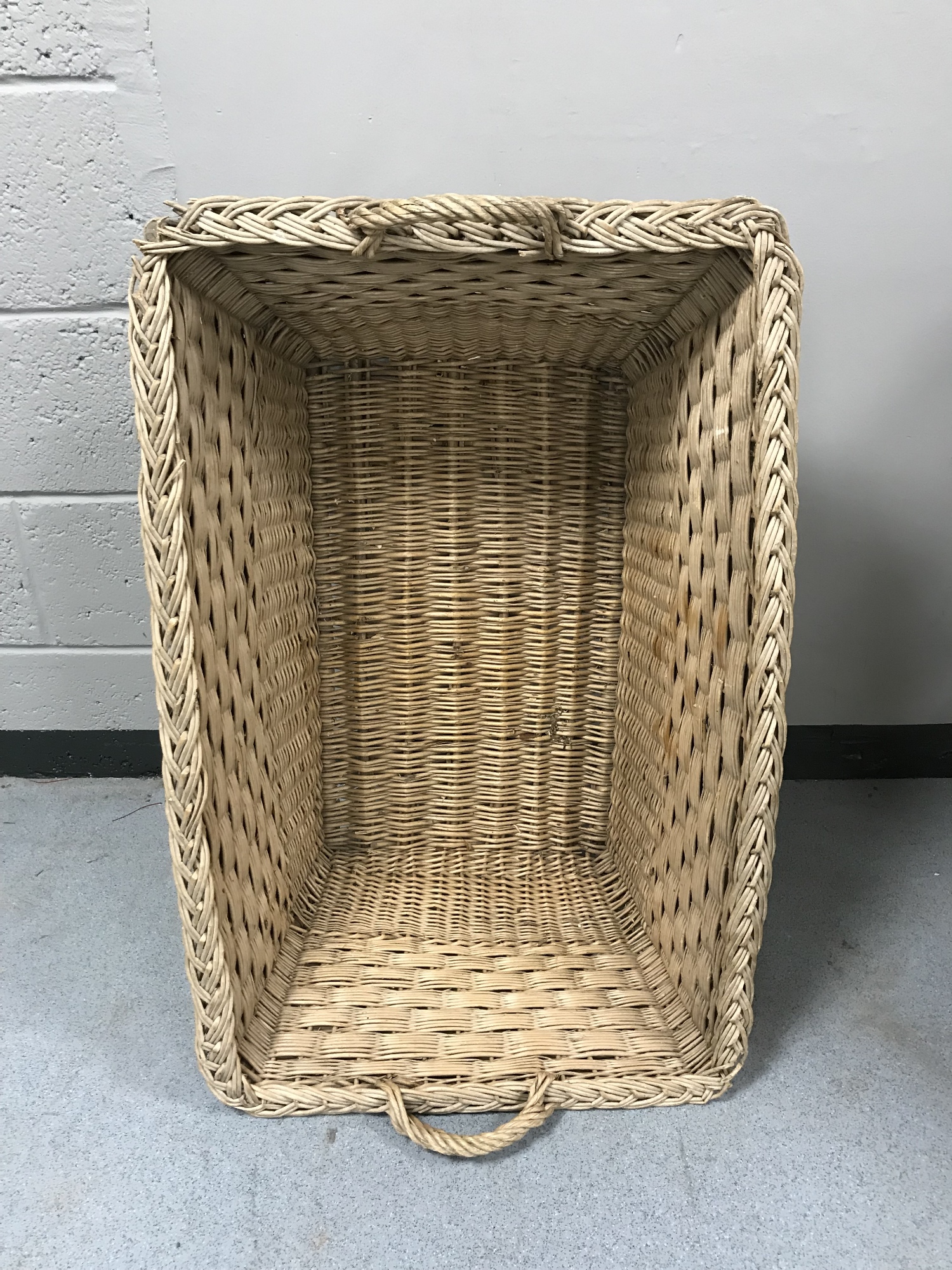 A large wicker log basket