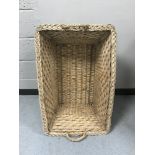 A large wicker log basket