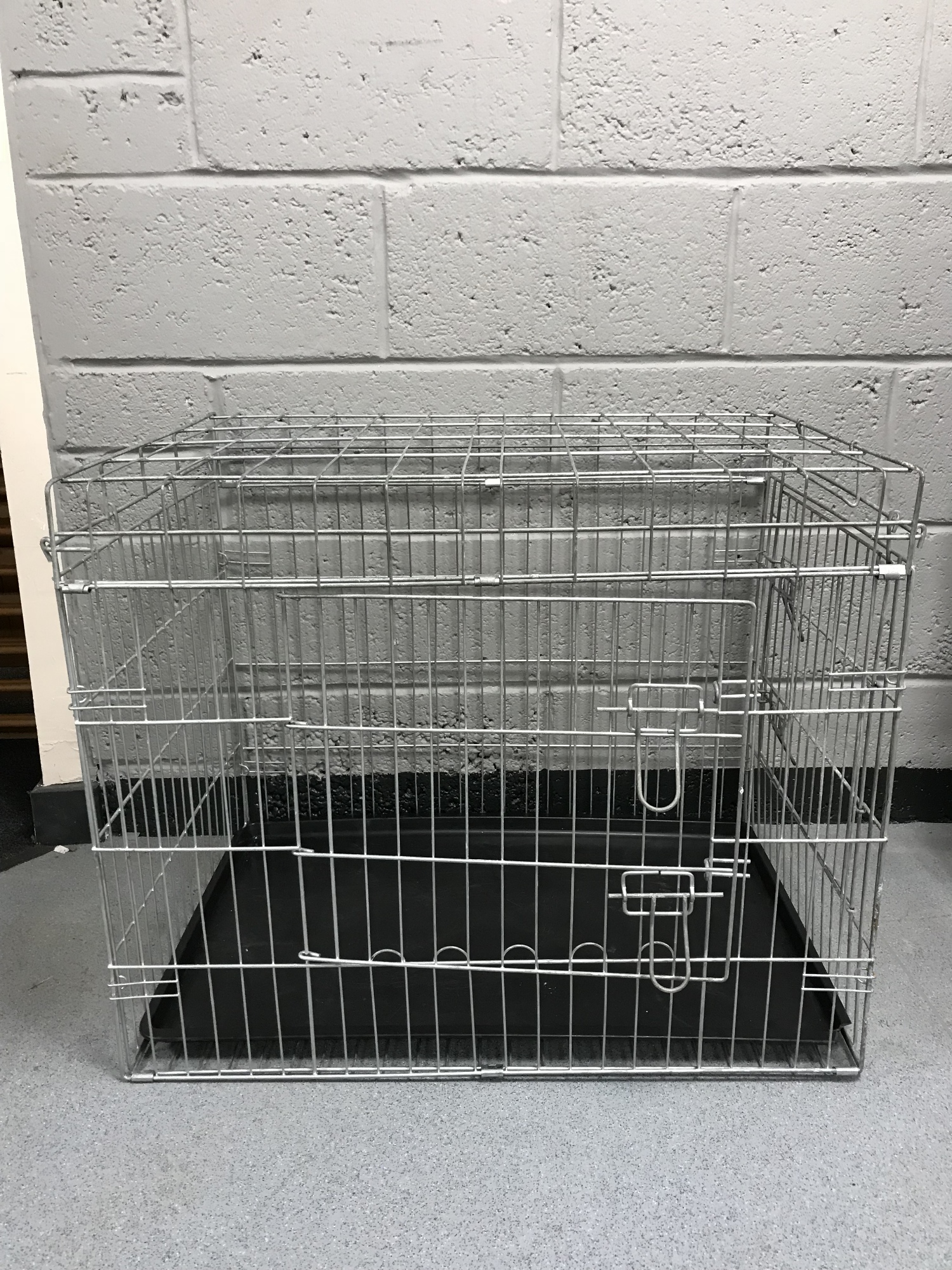 A large dog cage,