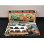 A boxed Hornby Railways task force action set and a boxed Hornby The world of Thomas The Tank