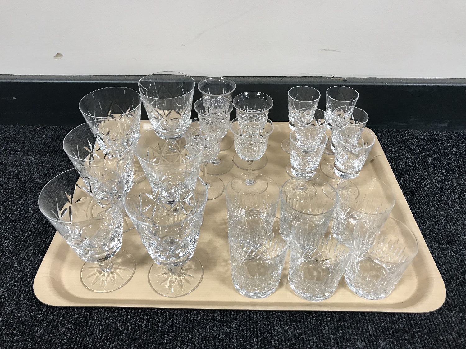 A tray of lead crystal drinking glasses,