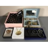 Two boxes containing a collection of costume jewellery