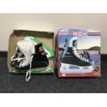 A pair of boxed CCM ice skates