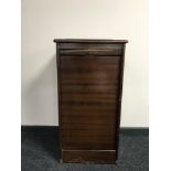 A mahogany music cabinet (locked)