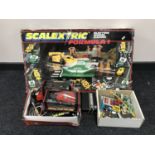 A box of Scalectrix Formula 1 racing set, with extra track,