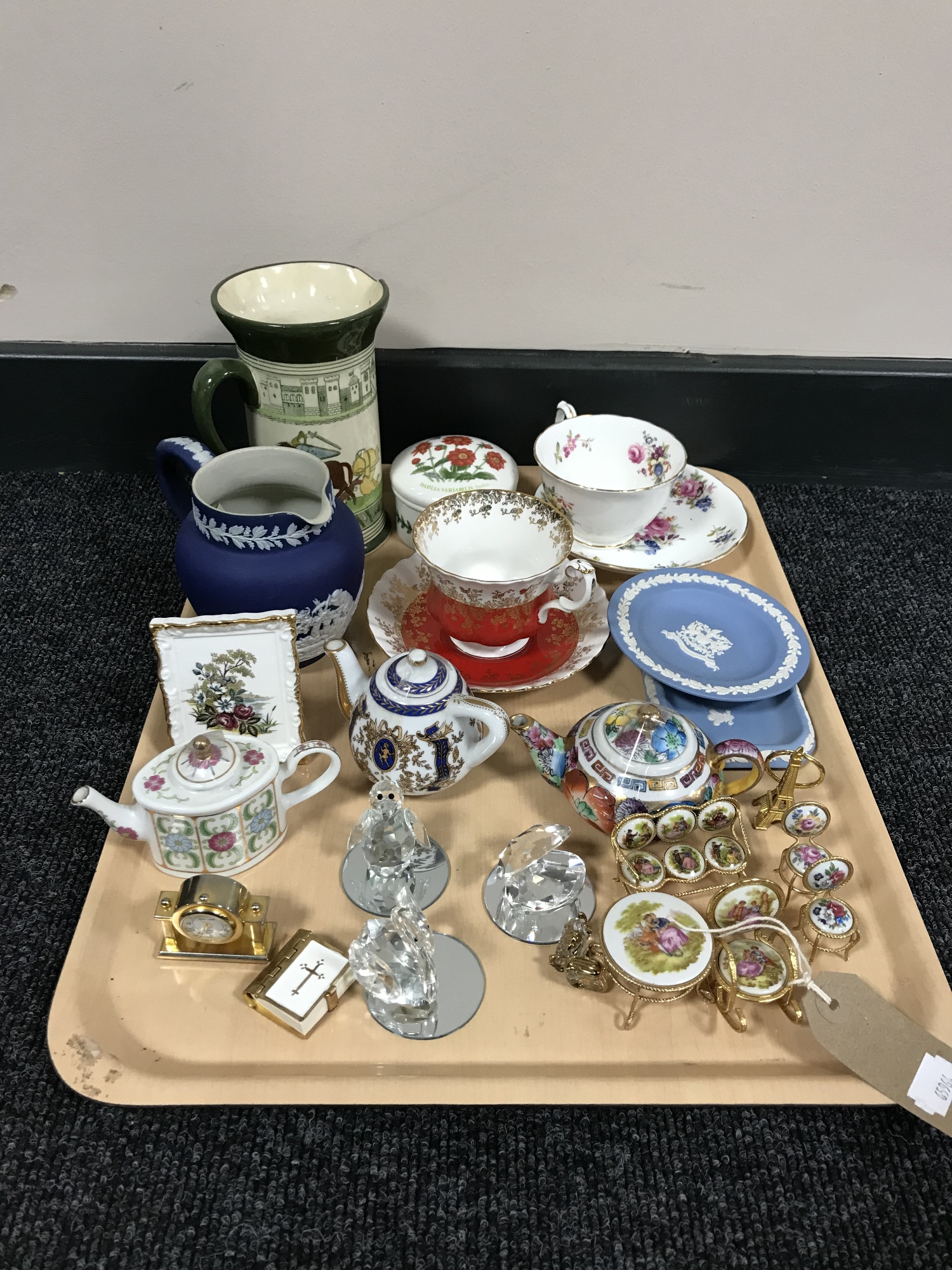 A tray containing blue and white jasperware, bone china cups and saucers,