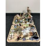 Two trays of assorted figurines, onyx eggs, china flower posies,