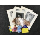 A quantity of black and white photographs and a box of film star postcards, 20th century postcards,